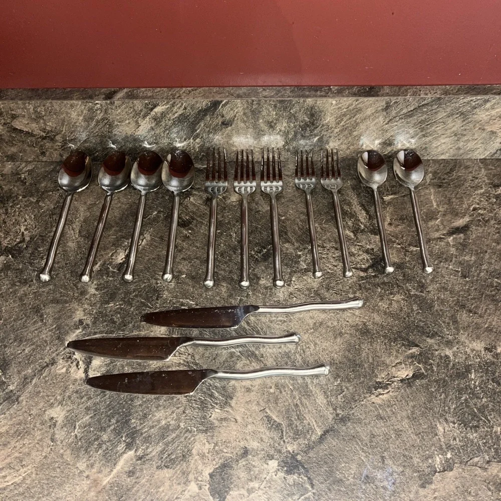 14 Pc Gourmet Settings EXOTIQUE PLATINUM 18/10  Stainless Wavy Satin Handle